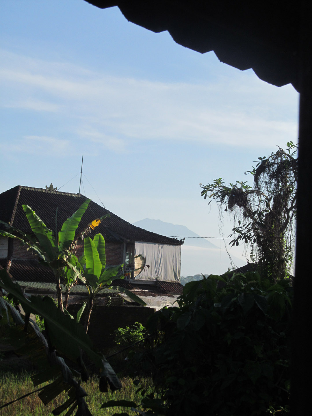 The view from inside my room, featuring Mt. Batur in the distance