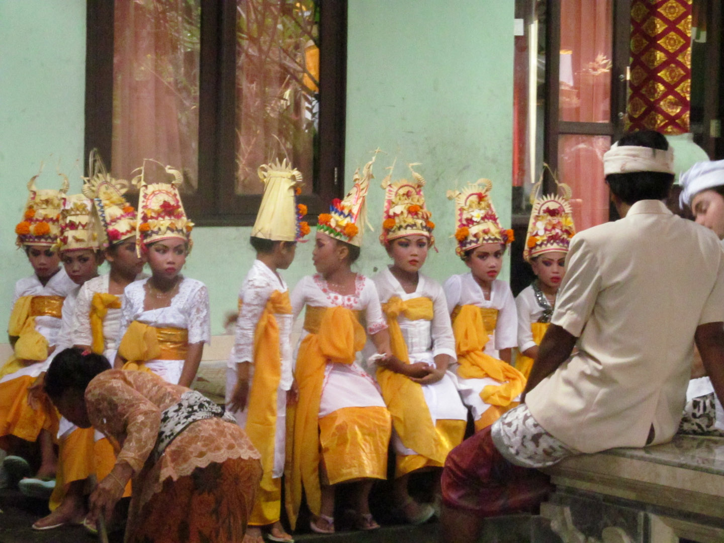 The young dancers. They had been likely dressed since early morning. They, too, were waiting for the ceremony to start.