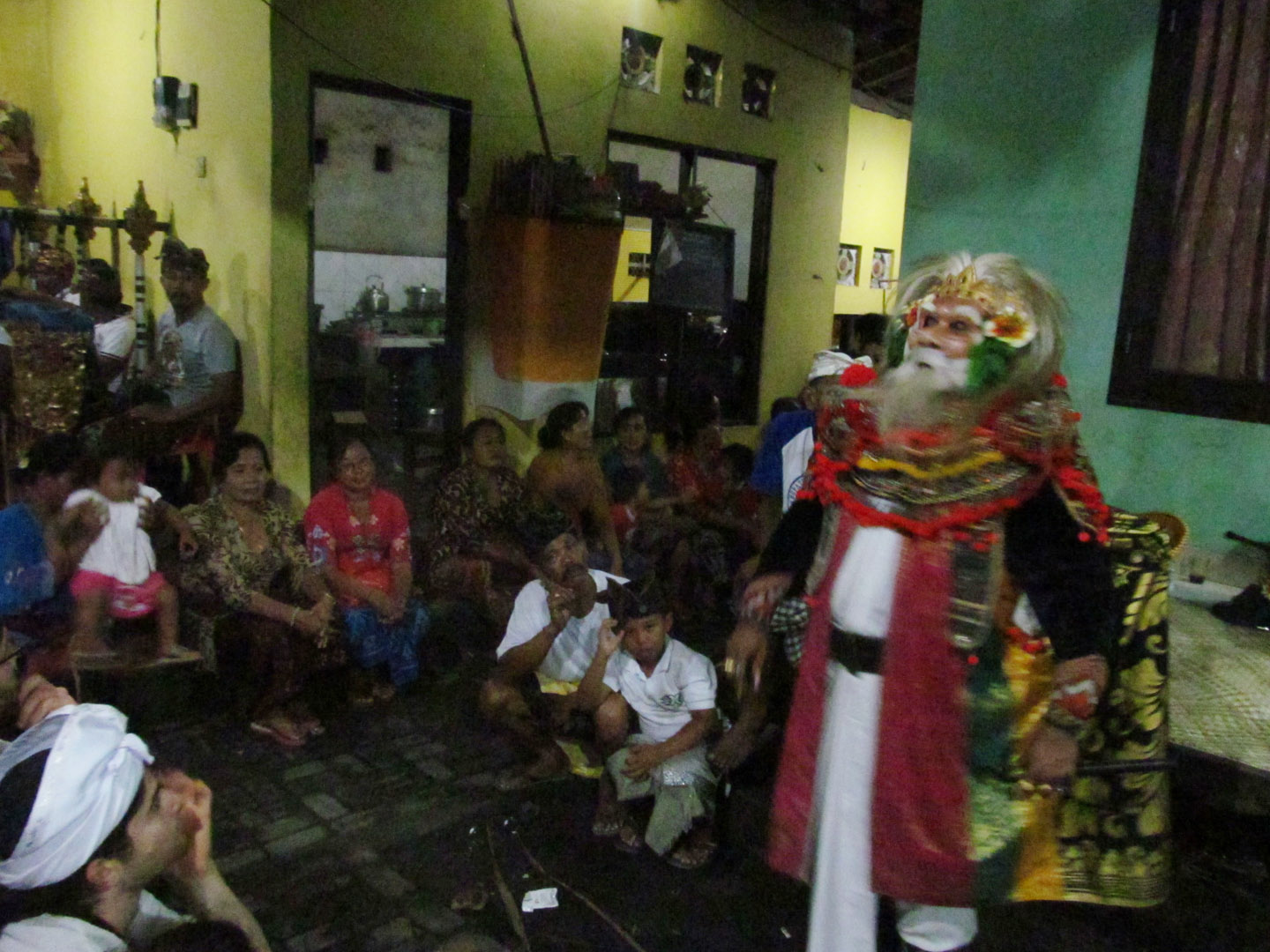 You can see more of the performance context in this photo of a bondres mask.
