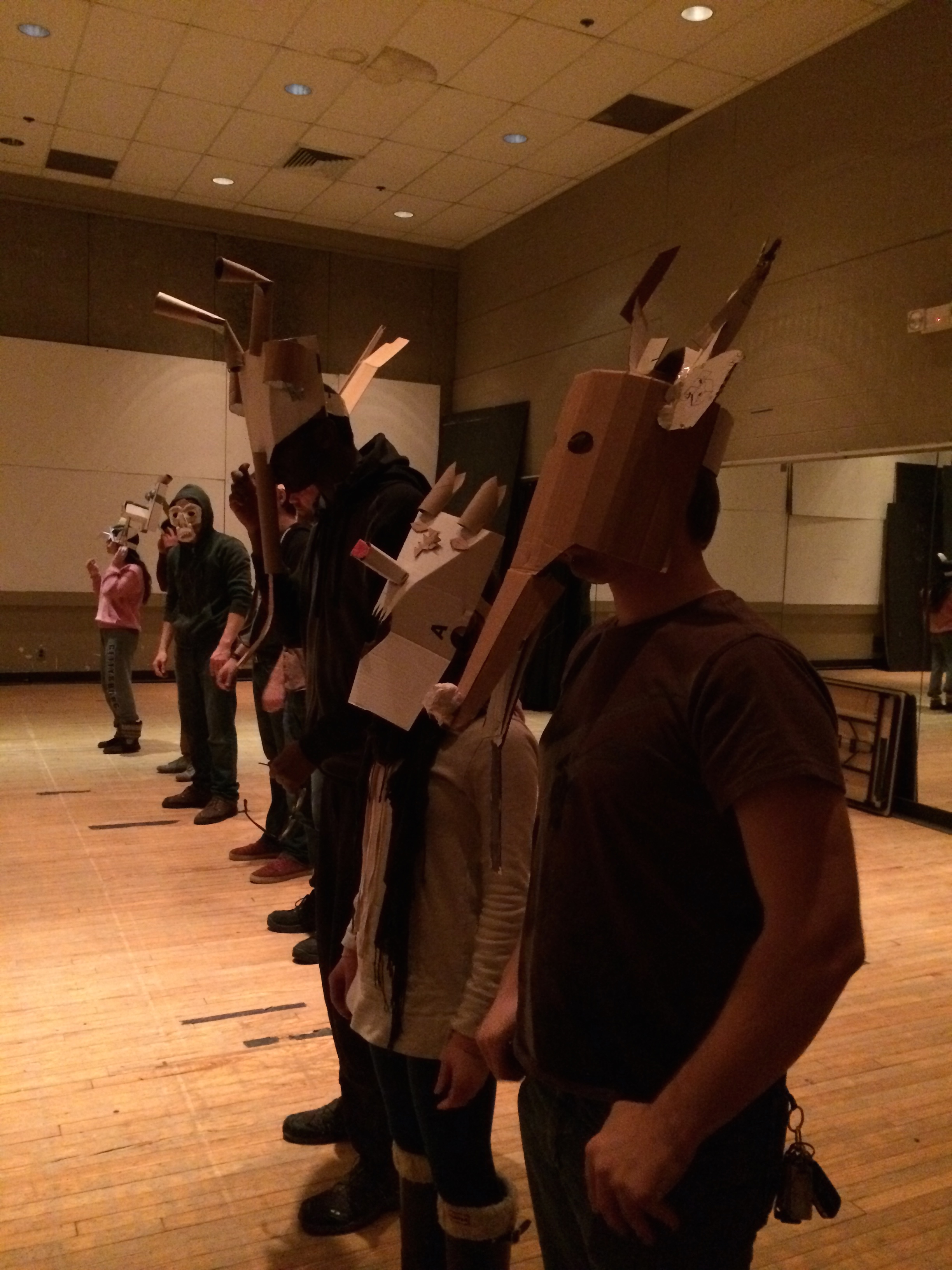 Masks aren't complete until the performer's body is added. We used this as a way to check in on our work as we built.