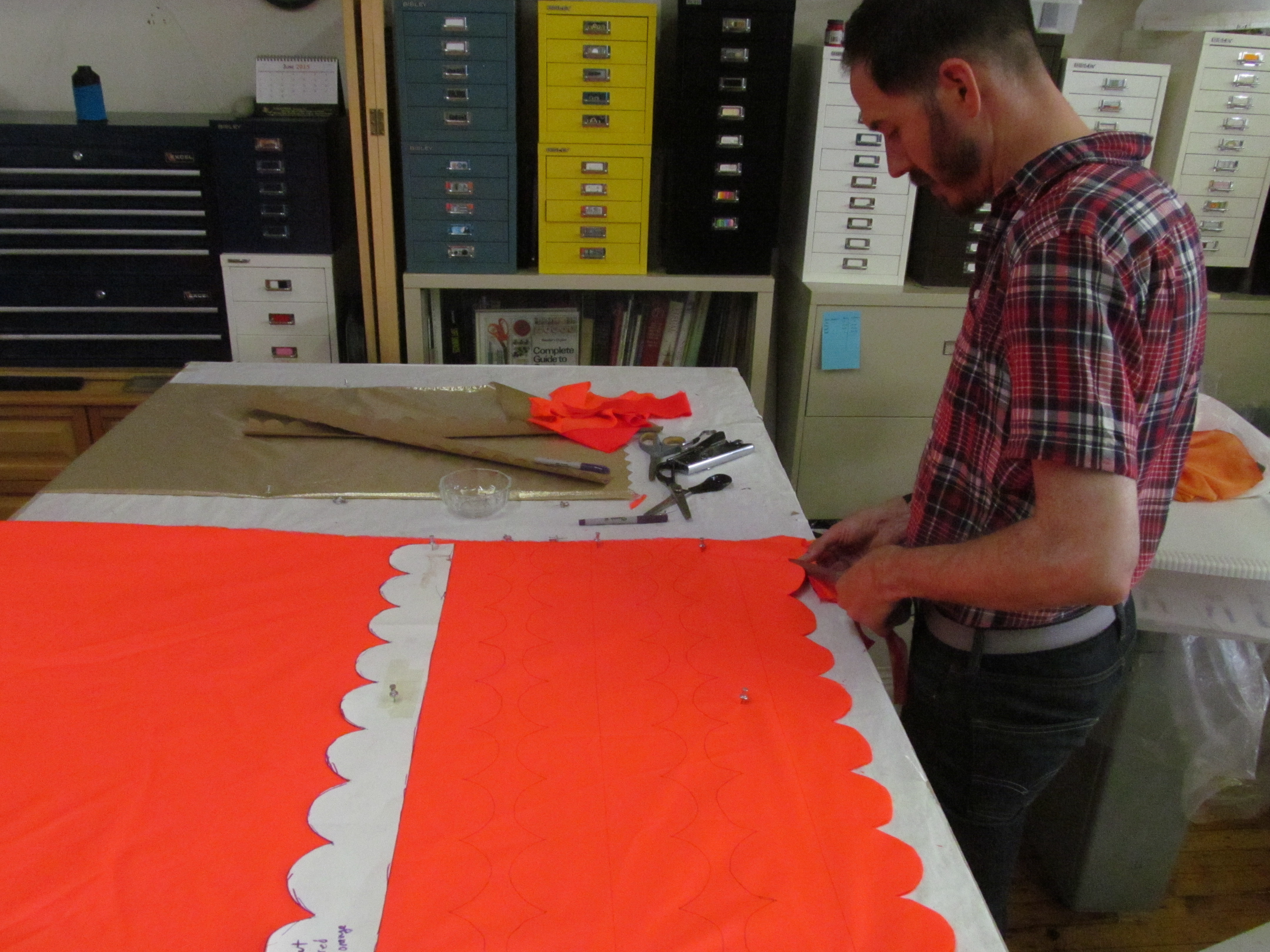 Cutting lots of fabric.